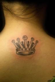 girl's back small crown tattoo pattern