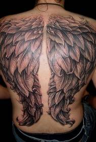 nugaros subtilus juodų sparnų tatuiruotės raštas