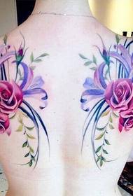 female back bright floral tattoo