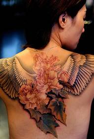 back tattoo with flowers and leaves together