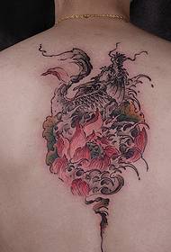 tattoo pattern combined with lotus and squid above the spine