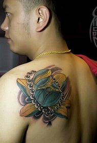 handsome beautiful back lotus bead tattoo