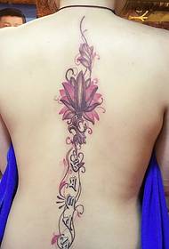 sexy goddess has a different flower tattoo