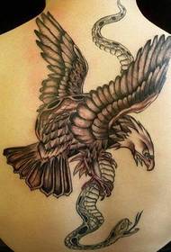 eagle catching snake's back personality tattoo