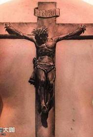 Atpakaļ Jēzus šķipsnu krustveida tetovējums
