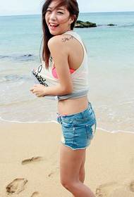 Taiwan beauty model Dongguan denim shorts beach back tattoo