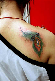 female back peacock feather tattoo picture