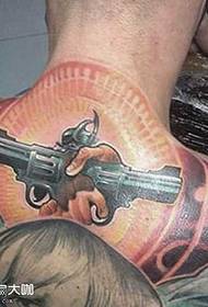 back hand gun tattoo pattern