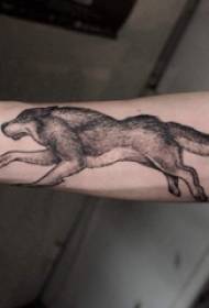 Little animal tattoo boy with arms on black running wolf tattoo picture