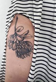 Tattoo pattern flower girl's arm on black gray flower tattoo picture