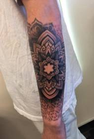 Flower tattoo boy arms on black vanilla tattoo picture