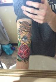 Tattoo owl boy painted arm tattoo owl pattern on arm