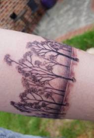 Plant tattoo girl arm on black armband tattoo picture