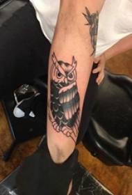 Arm tattoo material, male arm, black owl tattoo picture