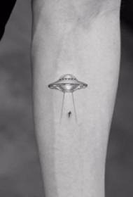 Tattoo black male student arm on black flying saucer tattoo picture