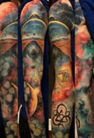 Arm tattoo material, male hand, colored landscape tattoo picture