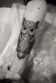 Arm tattoo picture boy arm on black owl tattoo picture