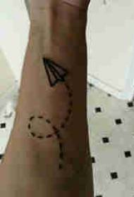 Paper airplane tattoo pattern male student arm on black paper airplane tattoo picture