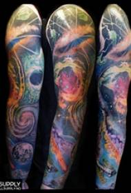 Arm tattoo picture boy's arm on colored cosmic tattoo picture