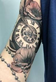 Tattoo black male student arm on flower and clock tattoo picture
