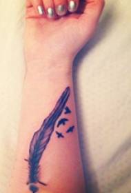 Arm tattoo material girl black feather tattoo picture on arm