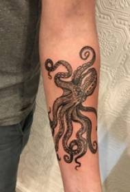 Black octopus tattoo