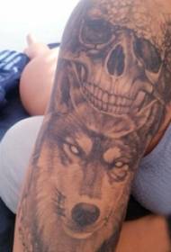 Skull and wolf tattoo pattern boy squat arm and wolf tattoo picture