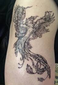 Tato lengan siswa pria phoenix pada gambar tato phoenix