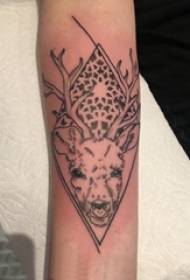 Arm tattoo picture boy's arm on rhombus and elk tattoo picture