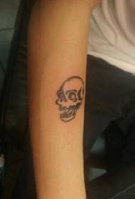 Abstract line tattoo boy's arm on black skull tattoo picture