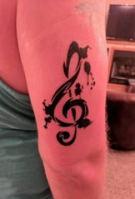 Musical note tattoo girl's arm upper note tattoo picture