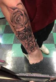 Rose tattoo illustration boy's arm on black gray rose tattoo picture