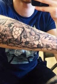 Arm tattoo material, male arm, geometry and wolf tattoo picture