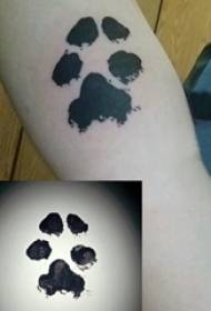Tattoo arm girl girl black paw print tattoo picture on girl arm