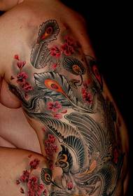 kobieta z pełnym tyłem klasyczny atmosferyczny feniks wzór tatuażu