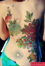 Woman back chrysanthemum tattoo work