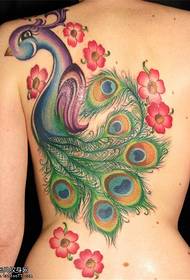 Female back colored peacock tattoo pattern