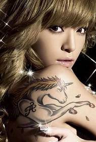 Japanese actress Ayumi Hamasaki rov qab unicorn tattoo