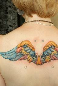 A woman's back colored wings tattoo works by tattoos