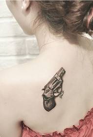 Beautiful back of the beautiful pistol tattoo pattern picture