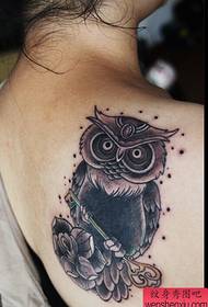 Back owl key tattoo work
