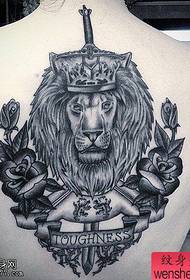A woman's back lion tattoo works by the best tattoo