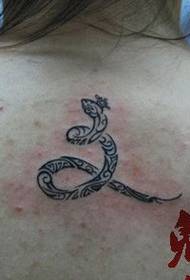 a girl's back totem snake tattoo pattern