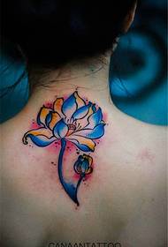 Female back color splash ink lotus tattoo pattern