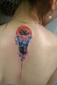 Woman's back colored light bulb tattoo works shared by the Tattoo Hall