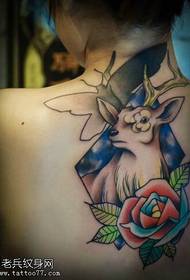 Female back colored antelope rose tattoo picture