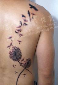 Male back with a stylish dandelion tattoo pattern
