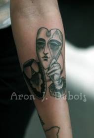 Ramię w stylu surrealistycznym tatuaż w kształcie maski Buddy