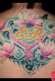 „Tattoo 520“ galerija: Atgal „Lotus“ tatuiruotės raštas