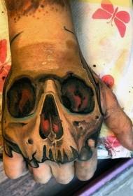 Nije styl kleurige minsklike skull tattoo op 'e rêch fan' e hân